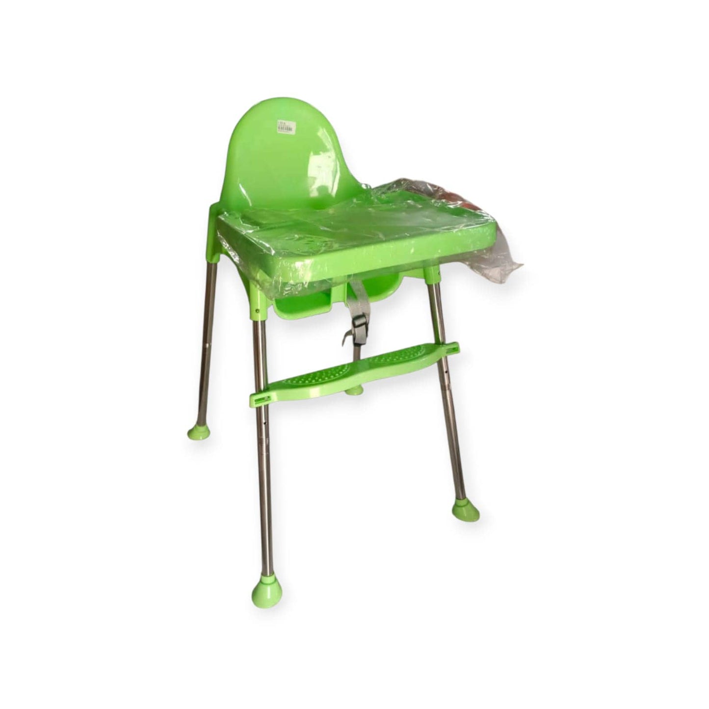 Green plastic high chair with a clear plastic cover on a white background